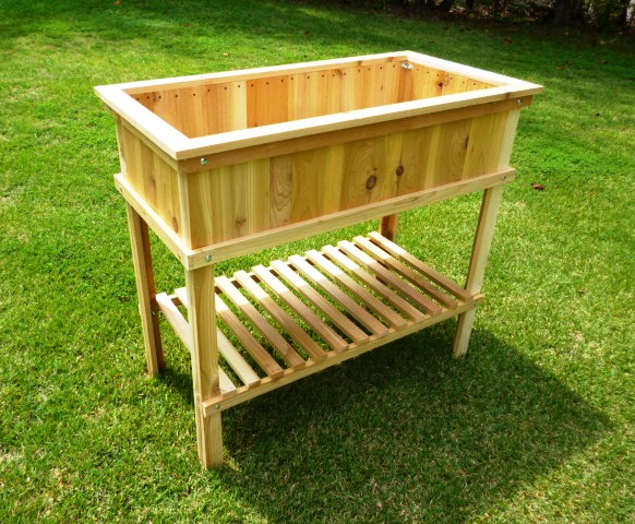  PLANS TO BUILD THIS RAISED GARDEN BED PLANTER. PLANS INCLUDE PHOTOS