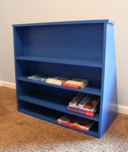 Rear storage area of child's bookshelf for extra books