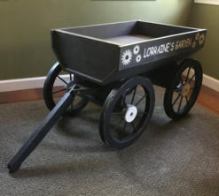 Wooden wagon showing the moveable handle