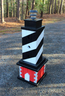 Square lighthouse painted like cape hatteras
